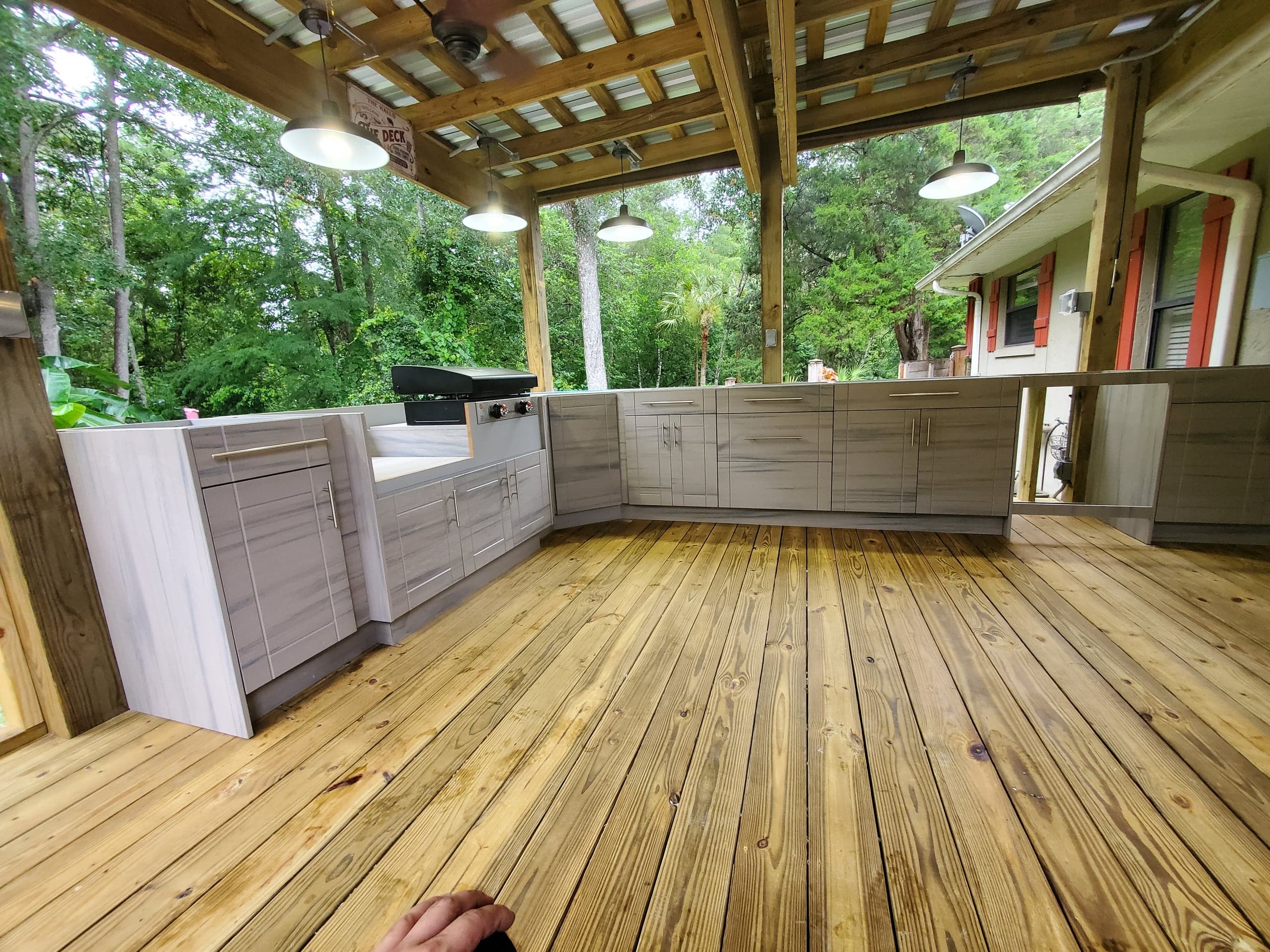 Wood deck with outdoor kitchen